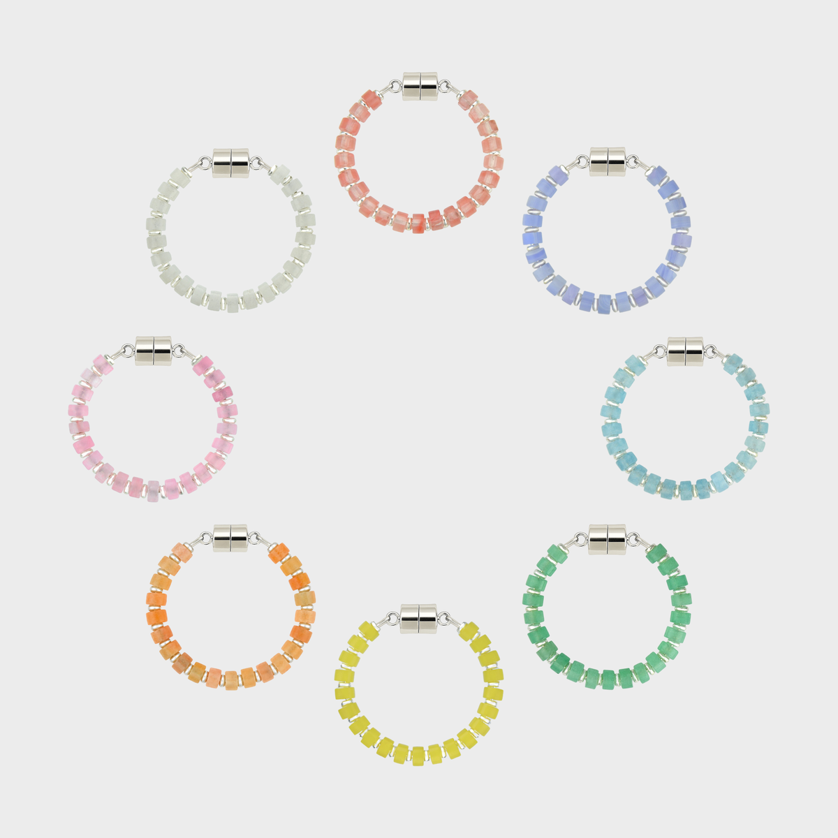 Easter Basket set of 8 magnetic wine charms arranged in a circle in Morganite, Blue Lace Agate, Aquamarine, Mint Variscite, Lemon Quartz, Peach Aventurine, Rose Quartz and White Moonstone with silver hardware