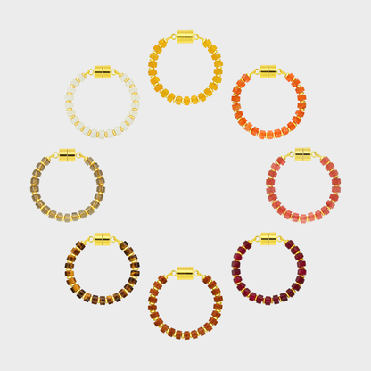 Equinox set of 8 magnetic wine charms arranged in a circle in Citrine, Mandarin Garnet, Red Carnelian, Ruby, Sunstone, Tiger Eye, Smoky Quartz and White Moonstone with gold hardware