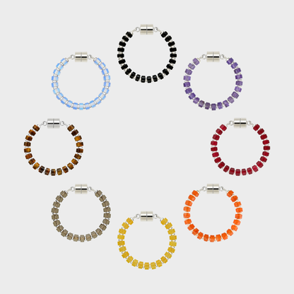 Haunted Manor set of 8 magnetic wine charms arranged in a circle in Black Onyx, Amethyst, Ruby, Mandarin Garnet, Citrine, Smoky Quartz, Tiger Eye and Opal with silver hardware