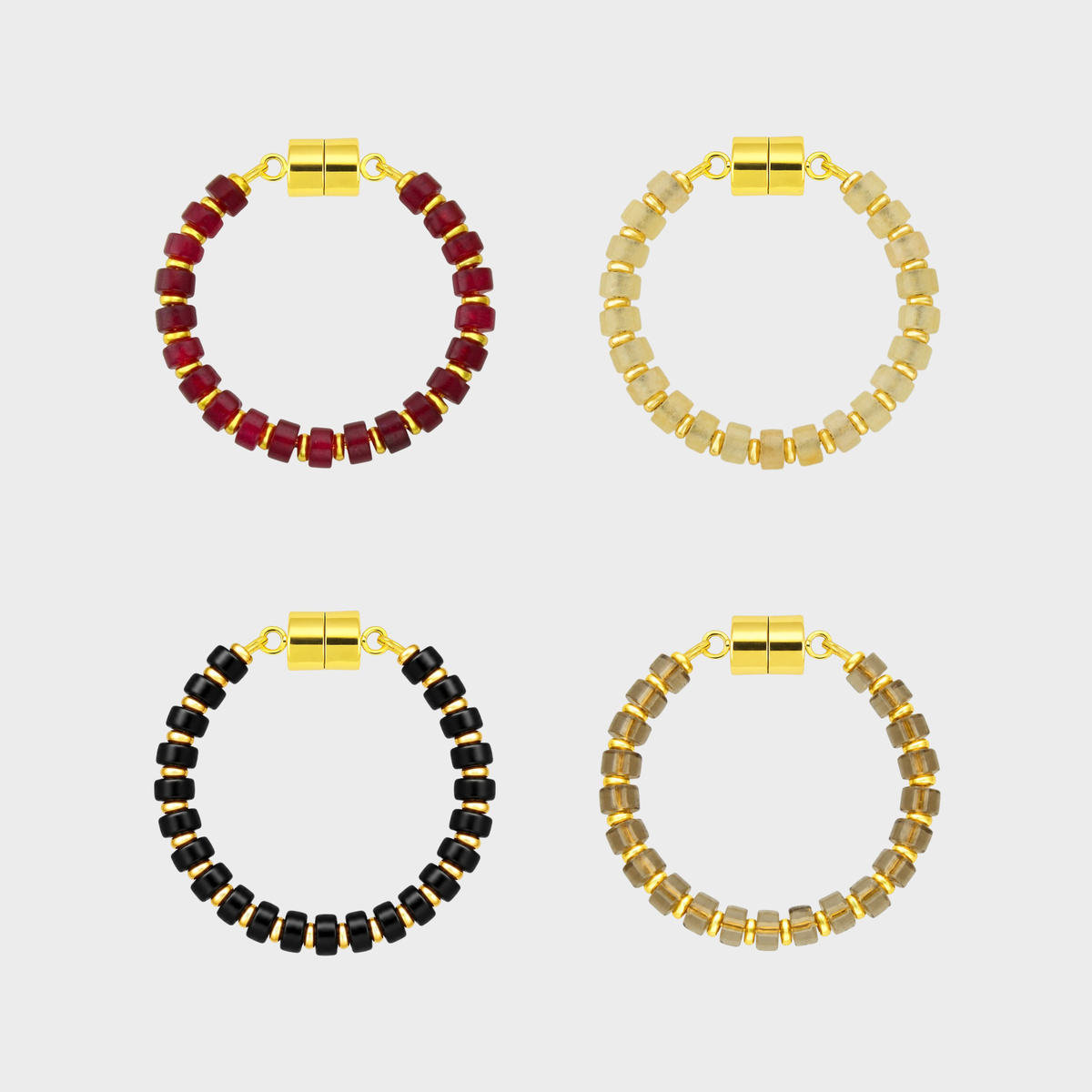 Candlelight set of 4 magnetic wine charms in Ruby, Champagne Zircon, Black Onyx and Smoky Quartz with gold hardware