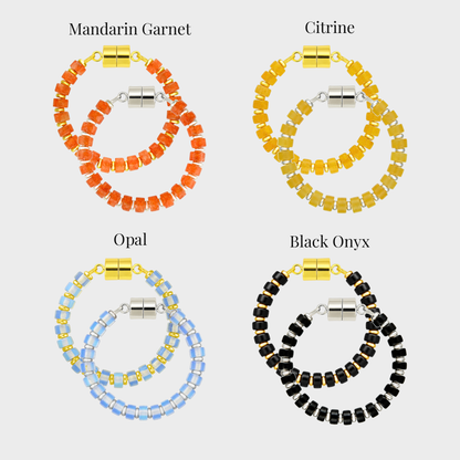 Candy Corn wine charm set showing each color name: Mandarin Garnet, Citrine, Opal and Black Onyx