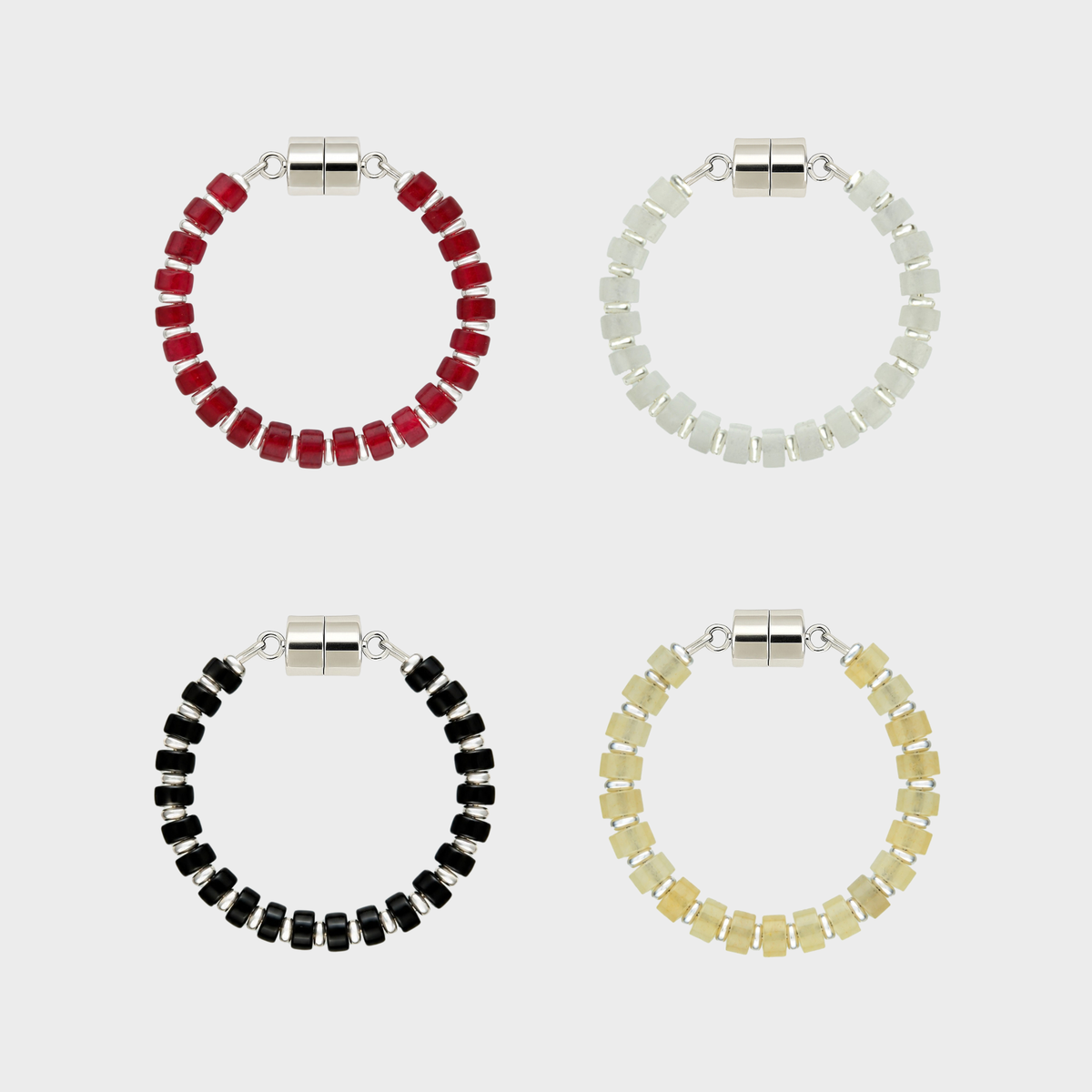 Crimson & White set of 4 magnetic wine charms in Ruby, White Moonstone, Black Onyx and Champagne Zircon with silver hardware