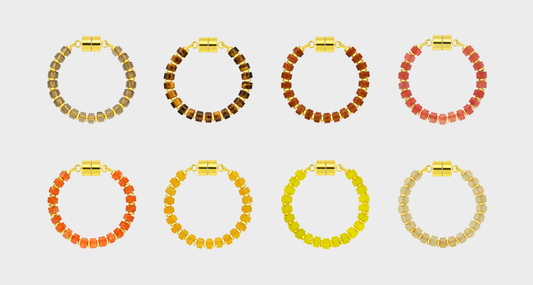 Golden Hour Ombré set of 8 magnetic wine charms in Smoky Quartz, Tiger's Eye, Sunstone, Red Carnelian, Mandarin Garnet, Citrine, Lemon Quartz and Champagne Zircon with gold hardware