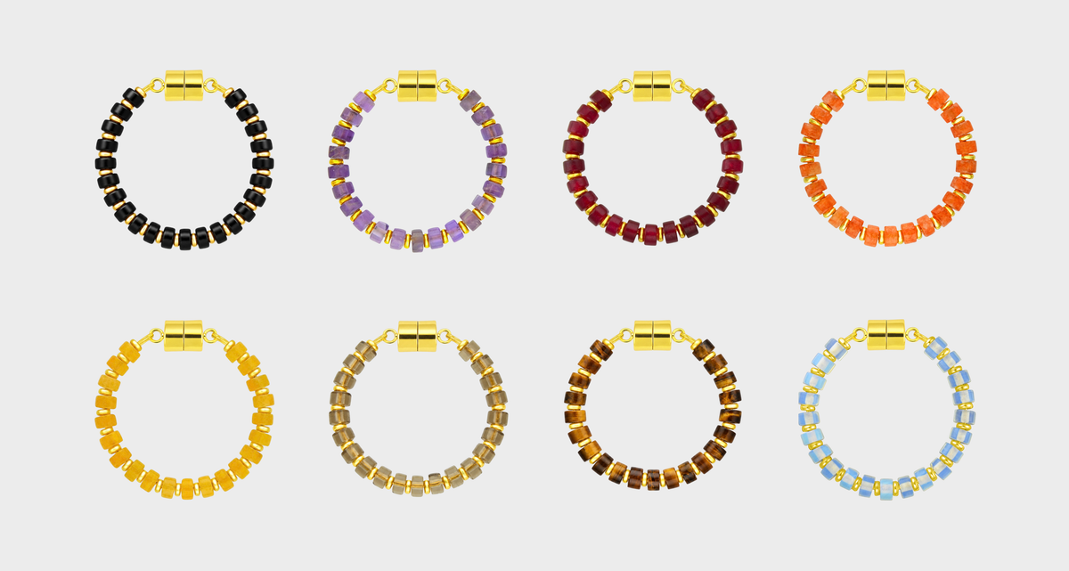 Haunted Manor set of 8 magnetic wine charms in Black Onyx, Amethyst, Ruby, Mandarin Garnet, Citrine, Smoky Quartz, Tiger Eye and Opal with gold hardware