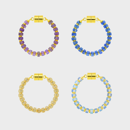 Her Majesty set of 4 magnetic wine charms in Amethyst, Sapphire, Champagne Zircon and Opal with gold hardware