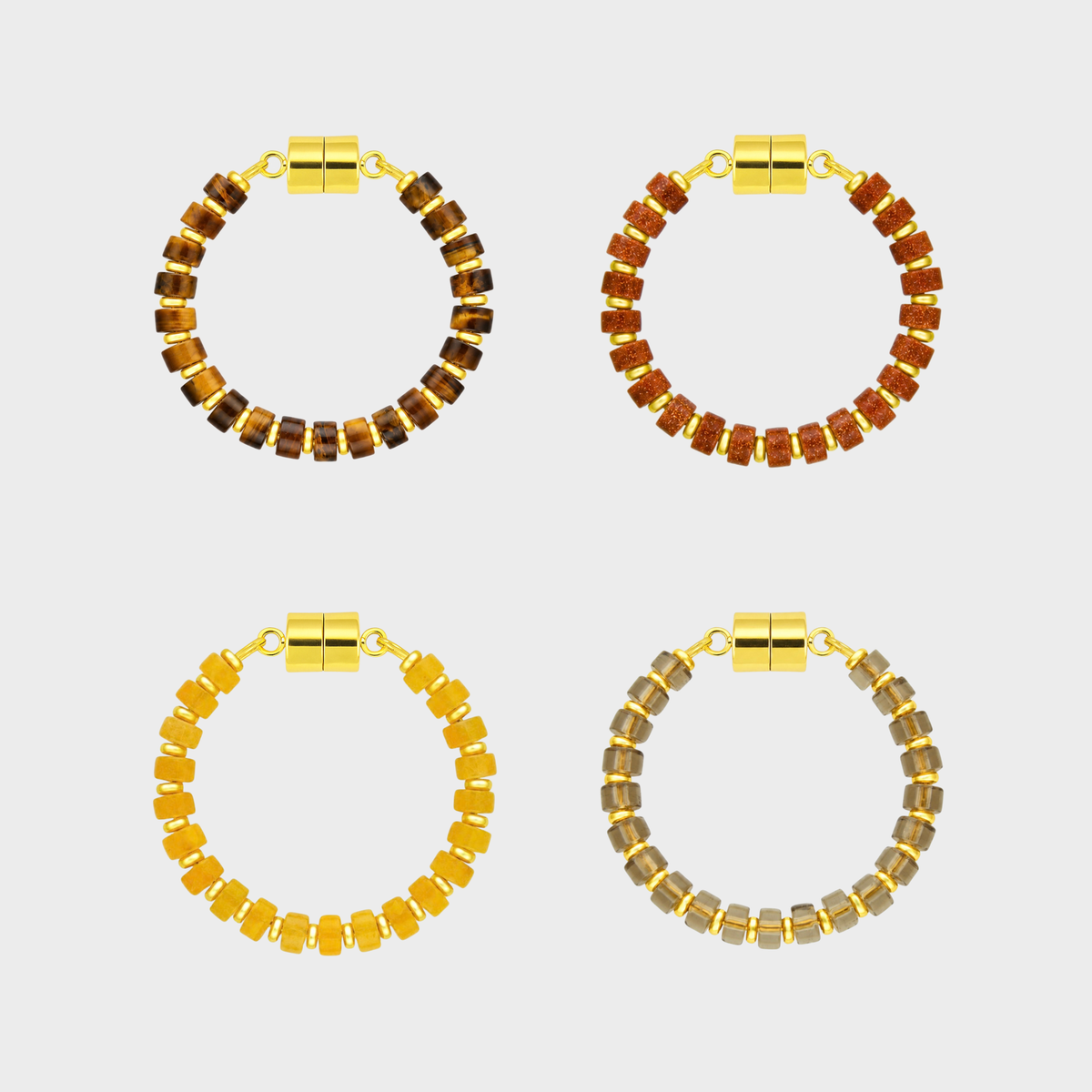 Set of 4 magnetic wine charms in brown and orange tones with gold metal