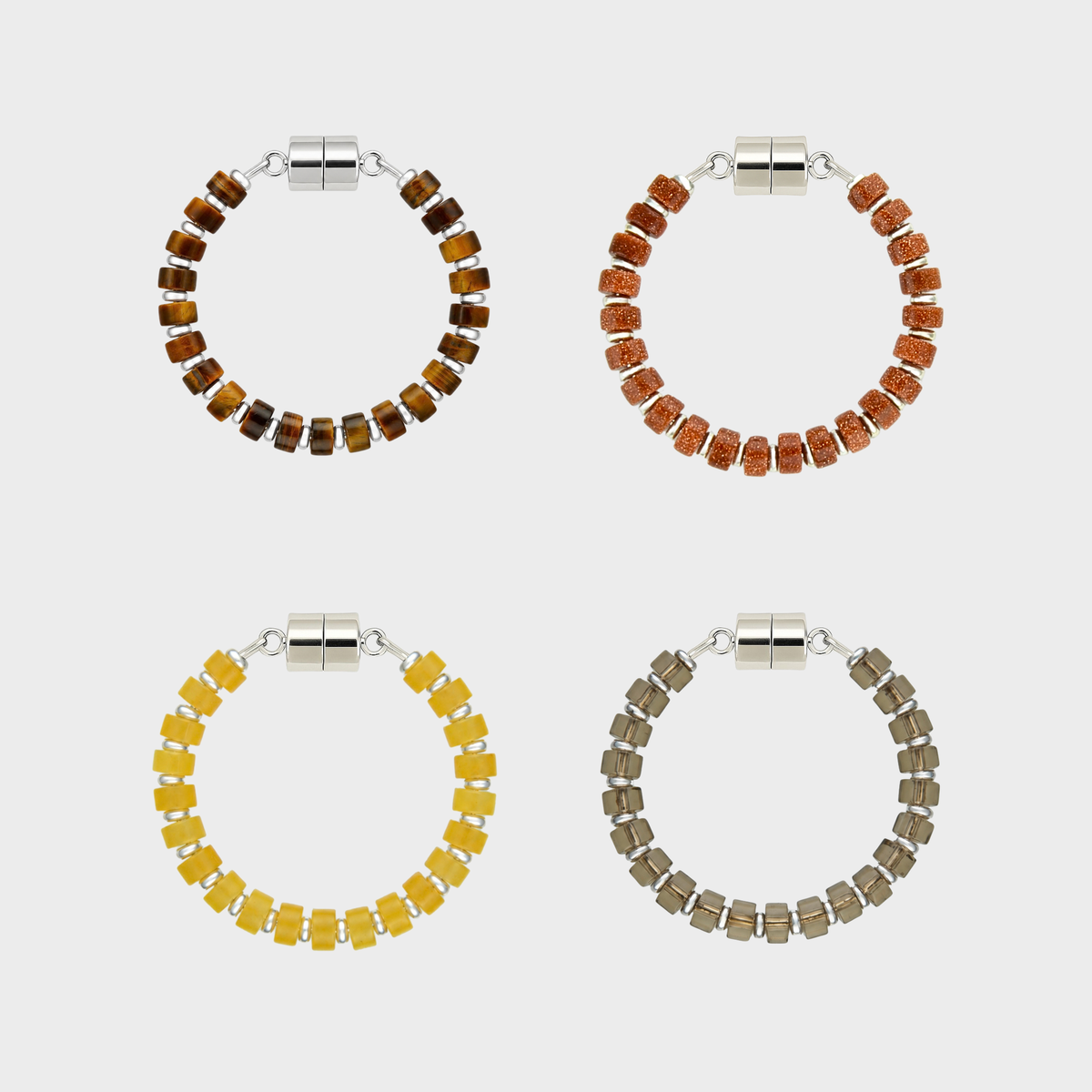 Set of 4 magnetic wine charms in brown and orange tones with silver metal