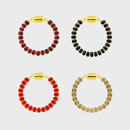 Midnight Bite set of 4 magnetic wine charms in Ruby, Black Onyx, Red Coral and Smoky Quartz with gold hardware