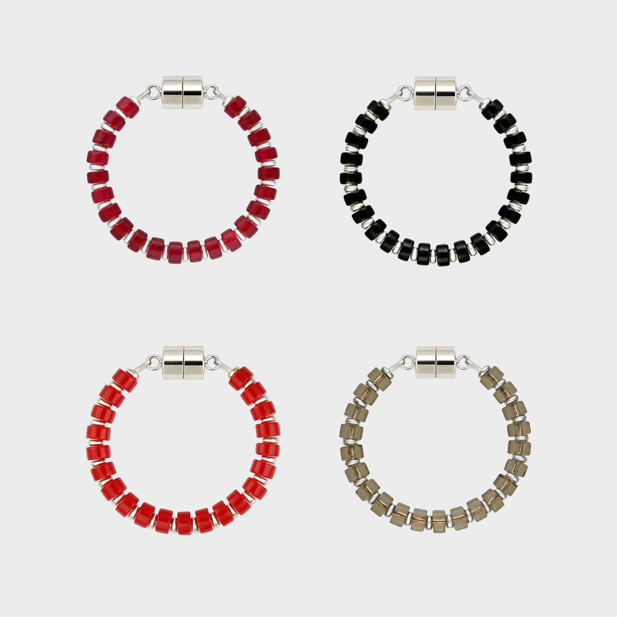Midnight Bite set of 4 magnetic wine charms in Ruby, Black Onyx, Red Coral and Smoky Quartz with silver hardware