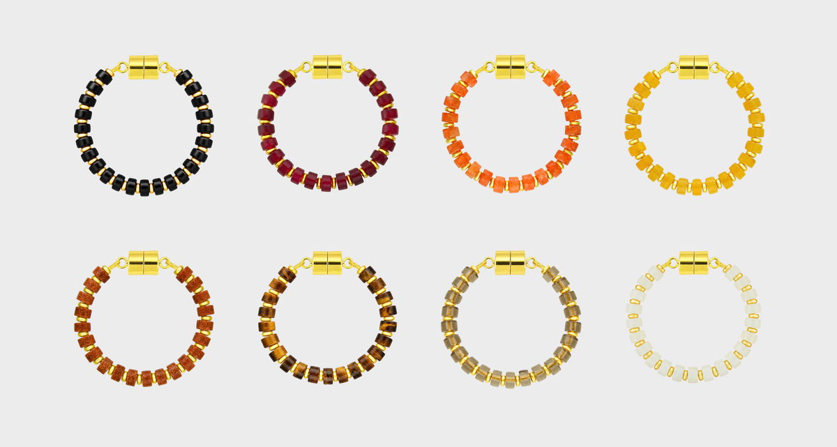 Nightfall set of 8 magnetic wine charms in Black Onyx, Ruby, Mandarin Garnet, Citrine, Sunstone, Tiger Eye, Smoky Quartz and White Moonstone with gold hardware