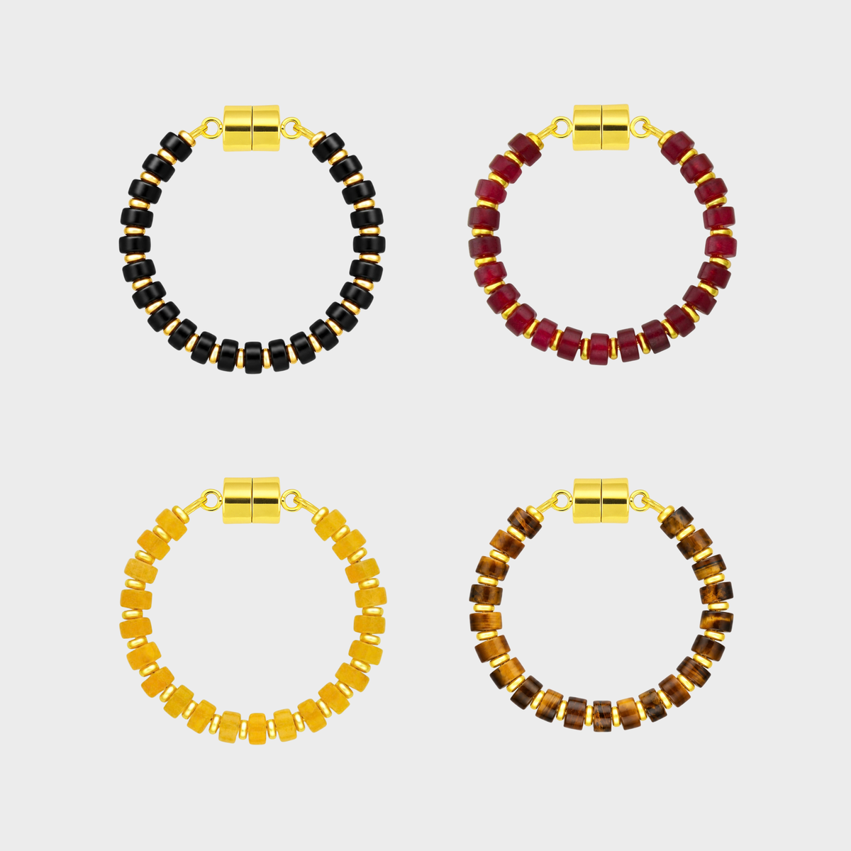 Nocturne set of 4 magnetic wine charms in Black Onyx, Ruby, Citrine and Tiger Eye with gold hardware