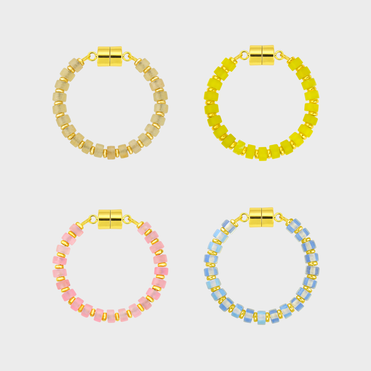 Pop the Bubbly set of 4 magnetic wine charms in Champagne Zircon, Lemon Quartz, Rose Quartz and Opal with gold hardware