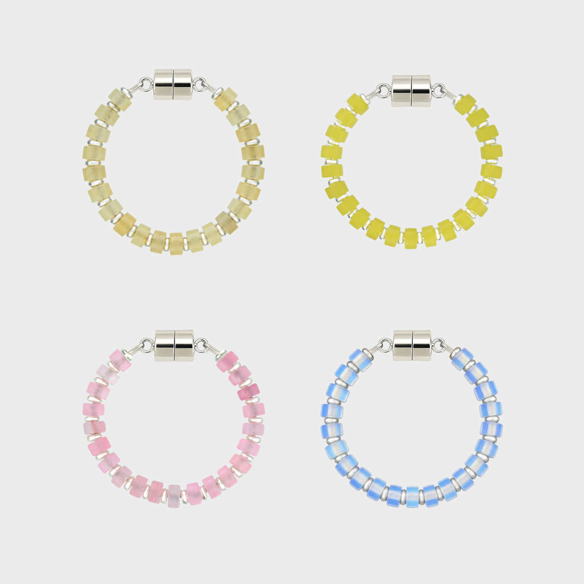 Pop the Bubbly set of 4 magnetic wine charms in Champagne Zircon, Lemon Quartz, Rose Quartz and Opal with silver hardware