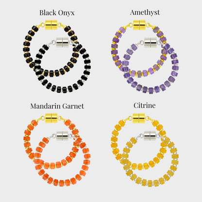 Witch's Brew wine charm set showing each color name: Black Onyx, Amethyst, Mandarin Garnet and Citrine