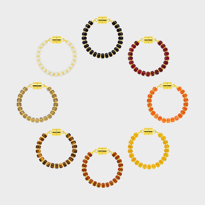 Nightfall set of 8 magnetic wine charms arranged in a circle in Black Onyx, Ruby, Mandarin Garnet, Citrine, Sunstone, Tiger Eye, Smoky Quartz and White Moonstone with gold hardware