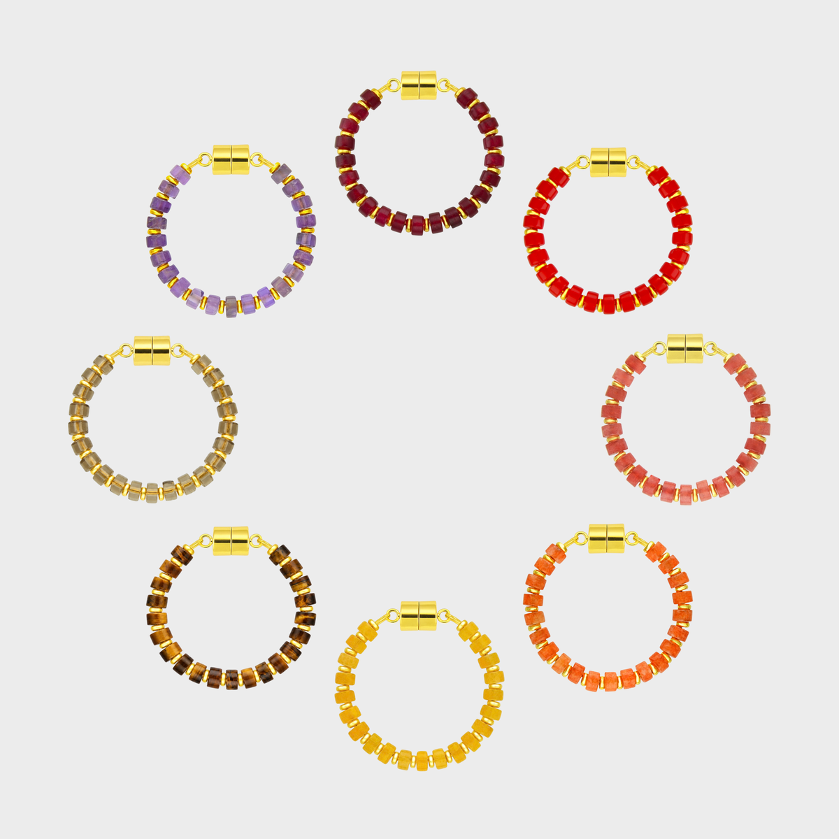 Reserve set of 8 magnetic wine charms arranged in a circle in Ruby, Red Coral, Red Carnelian, Mandarin Garnet, Citrine, Tiger Eye, Smoky Quartz and Amethyst with gold hardware