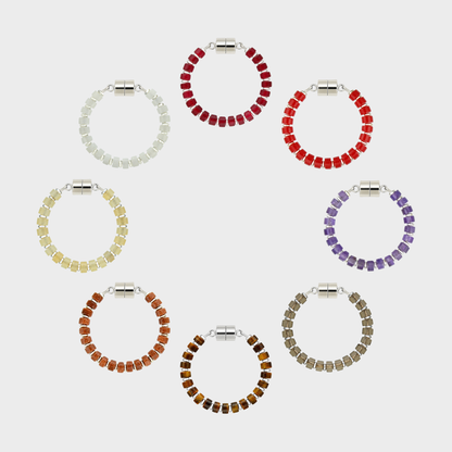 Vintner set of 8 magnetic wine charms arranged in a circle in Ruby, Red Coral, Amethyst, Smoky Quartz, Tiger Eye, Sunstone, Champagne Zircon and White Moonstone with silver hardware